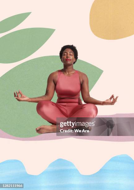 woman meditating sitting crosslegged - lotuspositie stockfoto's en -beelden