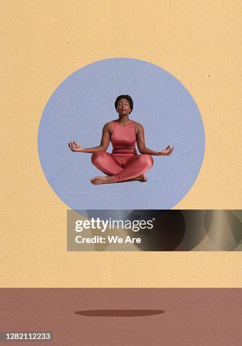 Woman meditating sitting crosslegged Woman meditating sitting crosslegged