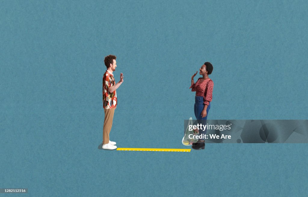 Two people in social distancing