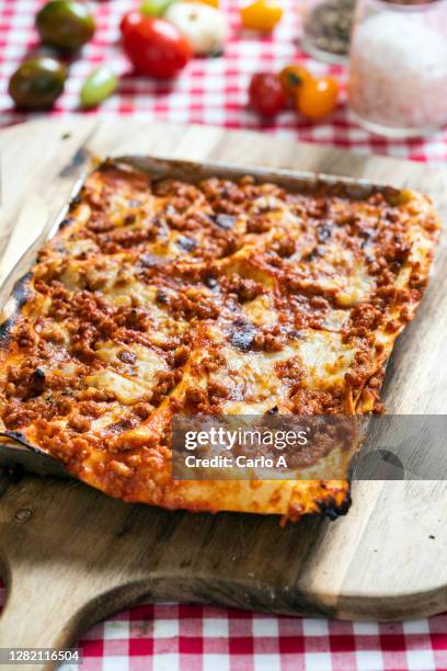 lasagna with ground beef tomato sauce and mozzarella cheese - lasagne stock pictures, royalty-free photos & images