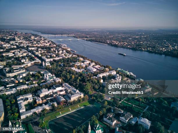 aerial view of volga river with bridges in yaroslavl city against sky, russia - volga stockfoto's en -beelden