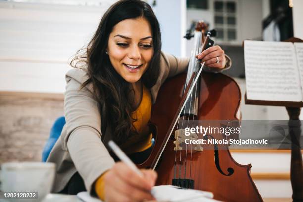 the musician composes at home - song writer stock pictures, royalty-free photos & images