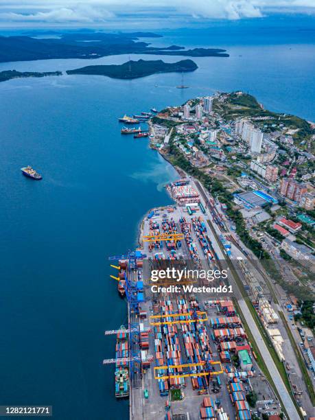 russia, primorsky krai, vladivostok, aerial view of commercial dock on shore of sea of japan - vladivostok city stock pictures, royalty-free photos & images