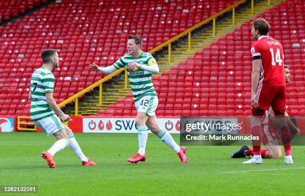 Callum McGregor of Celtic celebrates with teammate Ryan Christie after scoring his team's first goal during the Ladbrokes Scottish Premiership match...