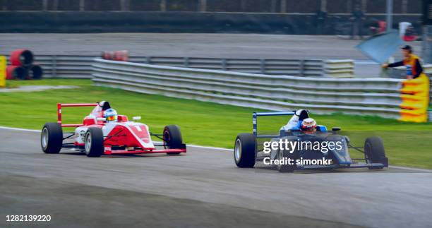 2 Man Racing Two Cars Racing Photos and Premium High Res Pictures - Getty Images