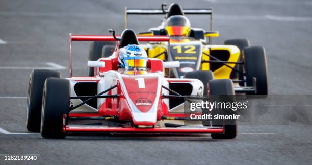 2 Man Racing Two Race Cars Photos and Premium High Res Pictures - Getty Images