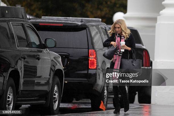 White House press secretary Kayleigh McEnany walks out of White House on October 25, 2020 in Washington, DC. President Donald Trump is departing for...