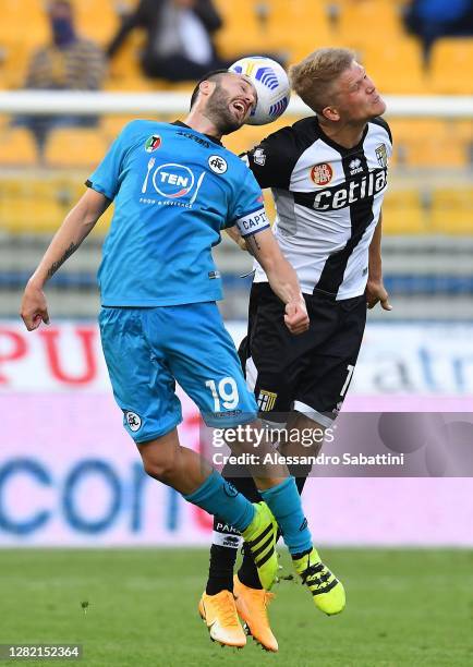 Andreas Cornelius of Parma Calcio competes for the ball with Claudio Terzi of Spezia Calcio during the Serie A match between Parma Calcio and Spezia...