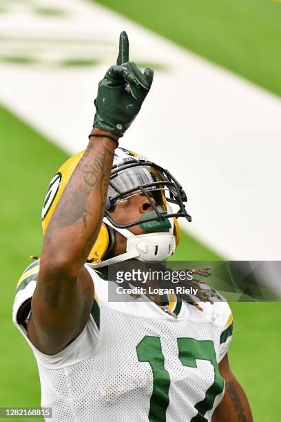 Davante Adams of the Green Bay Packers celebrates after a 3-yard touchdown reception from Aaron Rodgers , against the Houston Texans during the first...