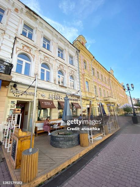 people relaxing in a restaurant in nizhny novgorod, russia - nizhny novgorod stock pictures, royalty-free photos & images