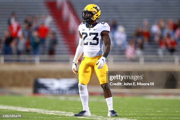 Spear Tykee Smith of the West Virginia Mountaineers prepares for a play during the second half of the college football game against the Texas Tech...