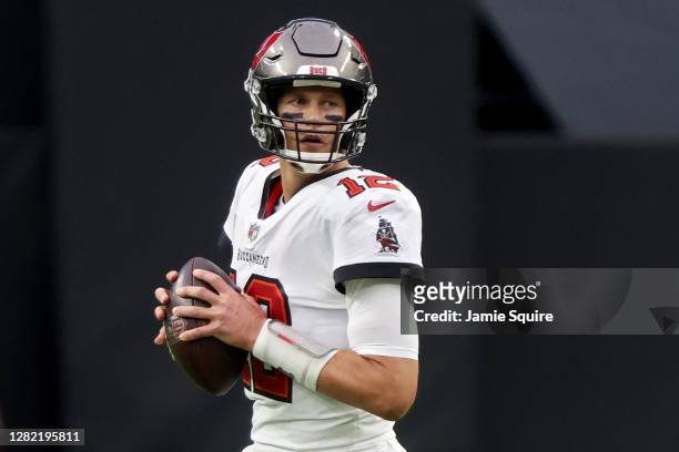 Tom Brady of the Tampa Bay Buccaneers drops back to pass in the second quarter against the Las Vegas Raiders at Allegiant Stadium on October 25, 2020...