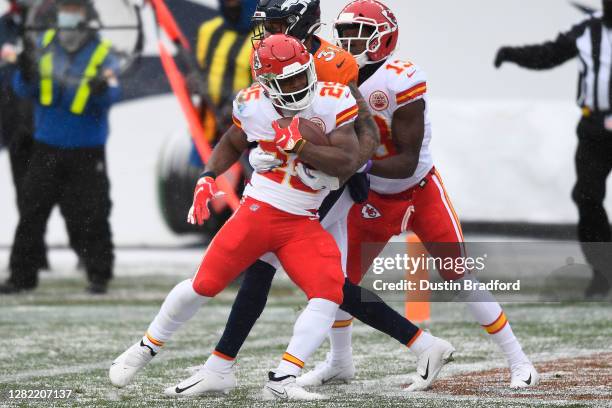 Clyde Edwards-Helaire of the Kansas City Chiefs scores a touchdown against the Denver Broncos in the first quarter of their NFL game at Empower Field...