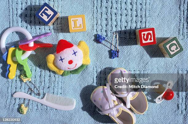 still life of baby accessories - accessory stockfoto's en -beelden