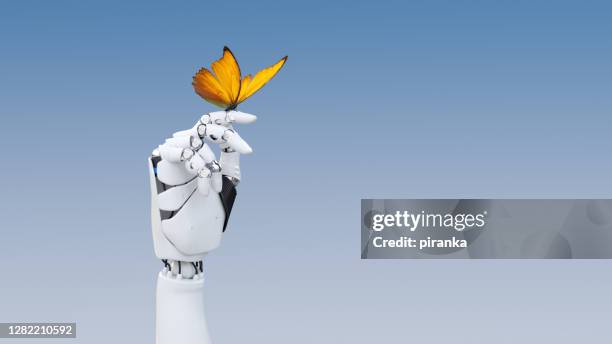 gentle robot hand - robot stock pictures, royalty-free photos & images