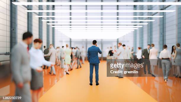 large group of business people in convention centre - cliqueimages stock pictures, royalty-free photos & images