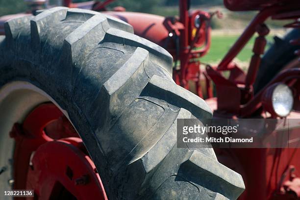 tractor tire tread - agricultural machinery stock pictures, royalty-free photos & images