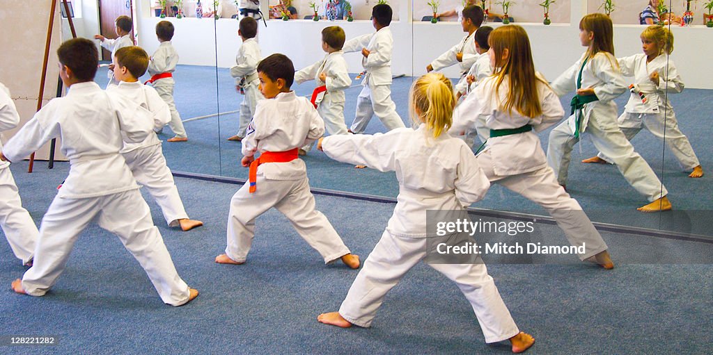 Children participating in karate workout