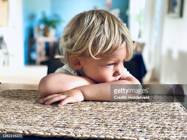 thinking toddler boy - punição imagens e fotografias de stock