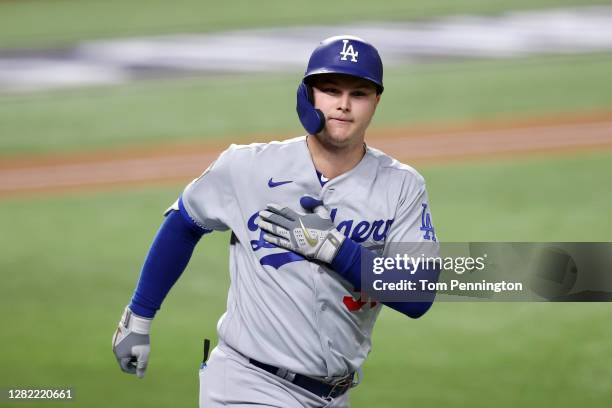 Joc Pederson of the Los Angeles Dodgers celebrates after hitting a solo home run against the Tampa Bay Rays during the second inning in Game Five of...