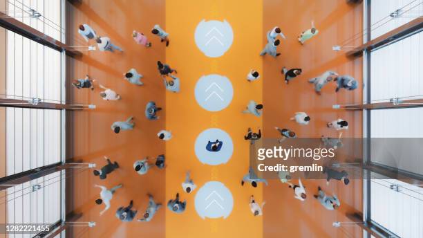 large group of business people in convention centre - crowd of people from above stock pictures, royalty-free photos & images