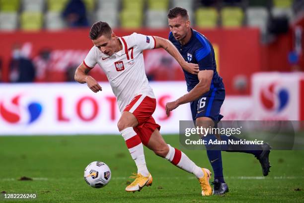 Damian Kadzior from Poland fights for the ball during the international friendly match between Poland and Finland at Energa Stadium on October 7,...
