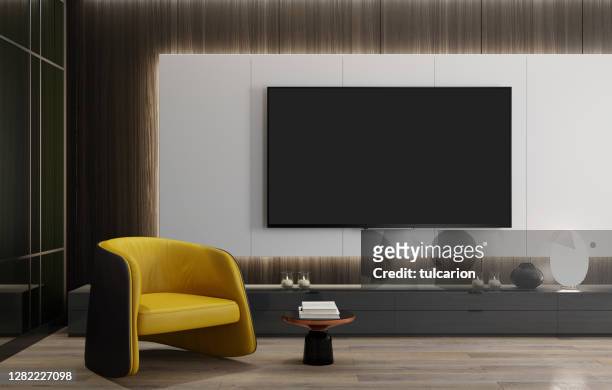 壁パネルの後ろにledライトが付くフラットテレビ付きの8kテレビルームモダンミニマリストリビングルーム - 液晶テレビ ストックフォトと画像