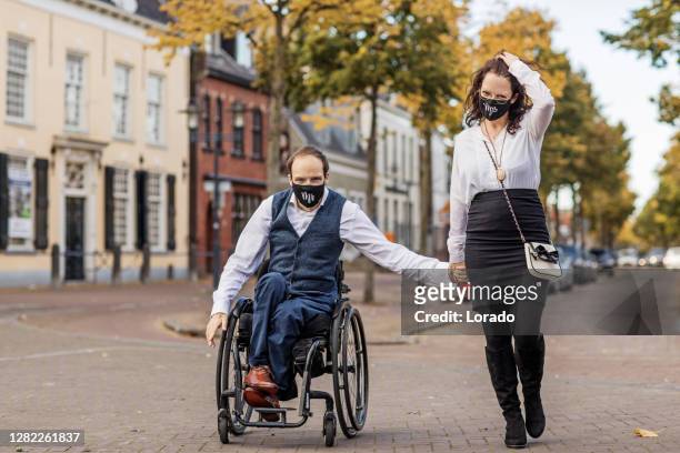 corona practices for a disabled couple on their wedding day - quarantine wedding stock pictures, royalty-free photos & images
