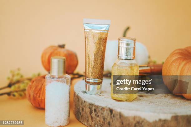 fall  composition of cosmetic and  beauty cream products,top view - pumpkin oil stock pictures, royalty-free photos & images