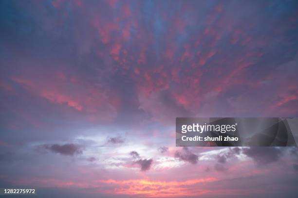 red clouds at sunrise - romantic sky stock pictures, royalty-free photos & images