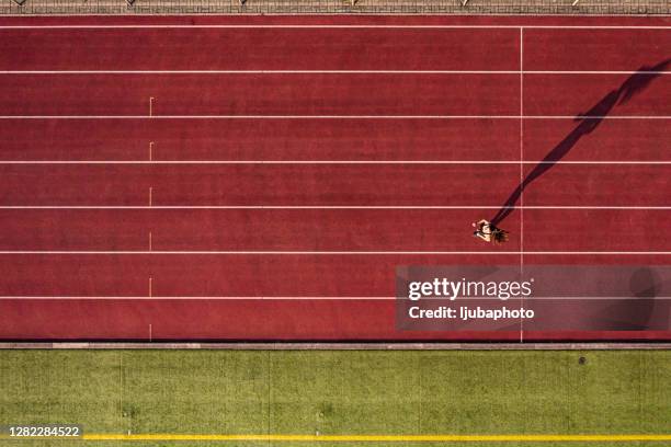 run for life - athletics track stock-fotos und bilder