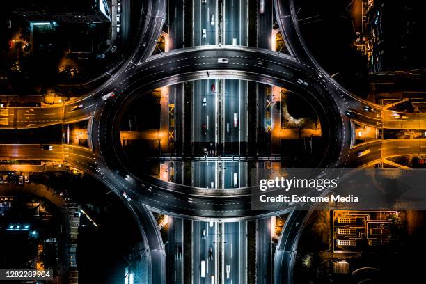 highway beneath the circle road seen from a drone point of view - serbia bridge stock pictures, royalty-free photos & images