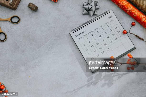 flat lay december calendar in rustic wood background - season schedule announcement stock pictures, royalty-free photos & images