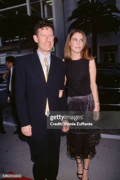 American country music singer-songwriter Lyle Lovett and girlfriend April Kimble attend the premiere of 'The Opposite of Sex', held at Sony Village...