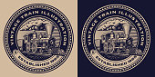 A black and white emblem with a vintage train.