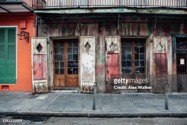 old new orleans street with abandoned buildings - new orleans architecture stock pictures, royalty-free photos & images
