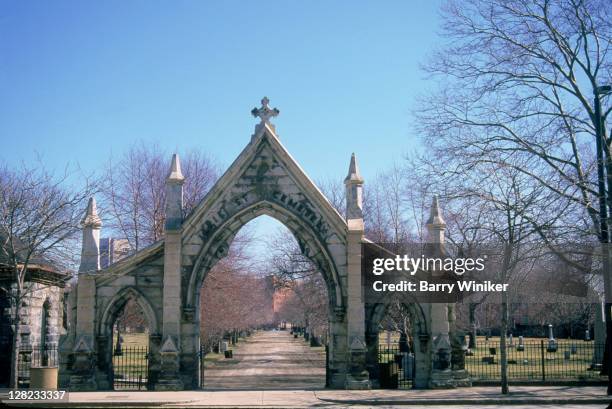 cemetery stone entrance, erie street, cleveland, oh - cemetery entrance stock pictures, royalty-free photos & images