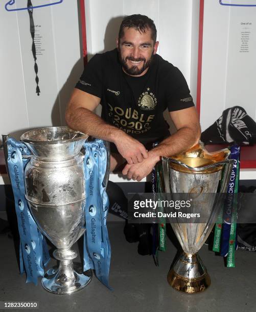 Don Armand of Exeter Chiefs poses with the Gallagher Premiership trophy and the European Champions Cup after their victory during the Gallagher...