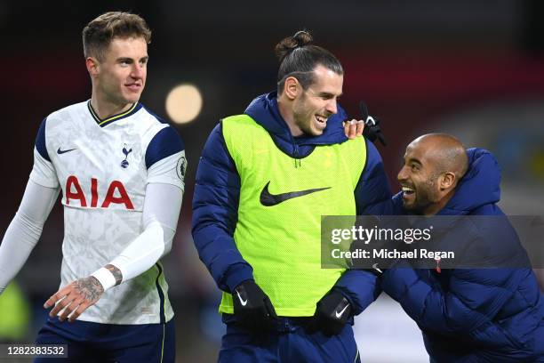 Joe Rodon, Gareth Bale and Lucas Moura of Tottenham Hotspur celebrate after the Premier League match between Burnley and Tottenham Hotspur at Turf...