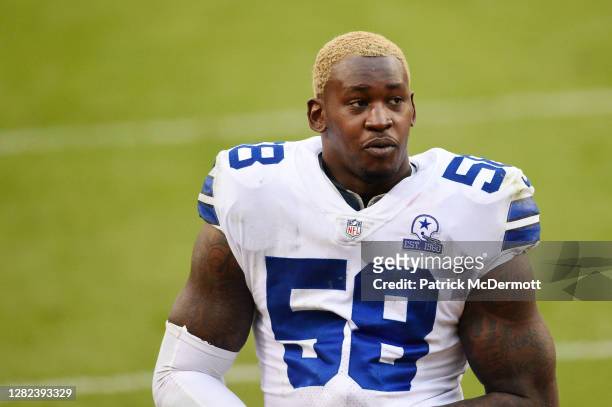 Aldon Smith of the Dallas Cowboys walks off the field after their 25-3 loss against the Washington Football Team at FedExField on October 25, 2020 in...