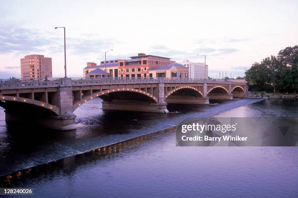 lights on bridge over grand river, grand rapids, mi - grand rapids michigan stock pictures, royalty-free photos & images