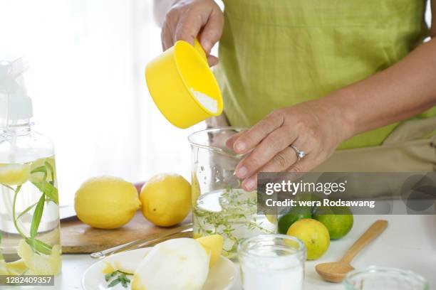 homemade citrus aromatic vinegar cleaner spray natural ingredients - baking soda stock pictures, royalty-free photos & images
