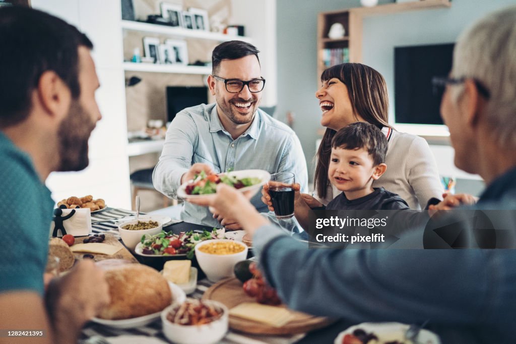 Extended family eating together