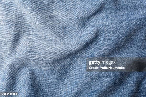 blue jeans texture background. - clothing texture stock pictures, royalty-free photos & images