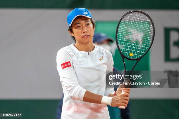 October 05. Shuai Zhang of China in action against Petra Kvitova of the Czech Republic in the fourth round of the Women's Singles competition on...