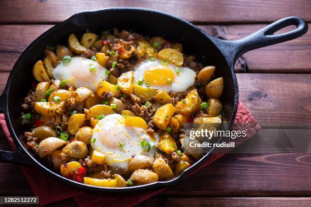 skillet breakfast - prepared potato stock pictures, royalty-free photos & images