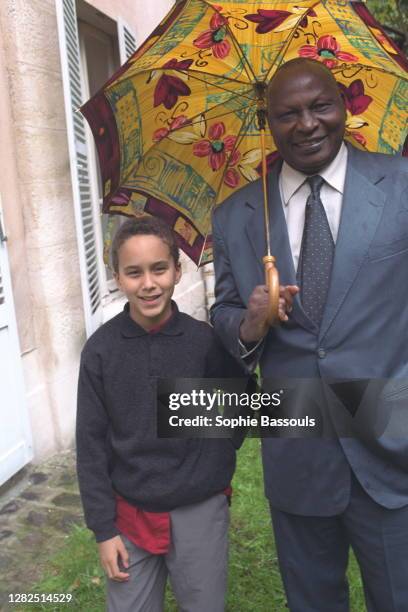 Ahmadou Kourouma with his grandson.