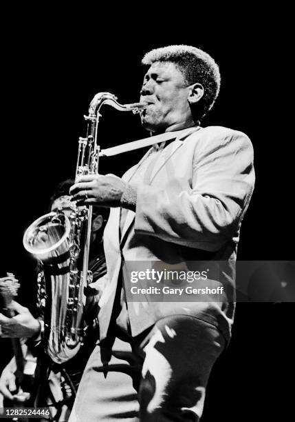 American Rock musician Clarence Clemons plays saxophone as he performs onstage , during the 'Born in the USA' tour, at Brendan Byrne Arena , East...