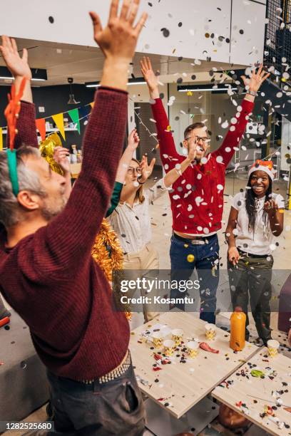 happy new year! - christmas party office stock pictures, royalty-free photos & images