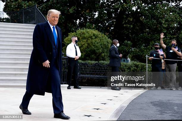 President Donald Trump walks out of the White House on October 27, 2020 in Washington, DC. President Trump and First Lady Melania Trump are heading...